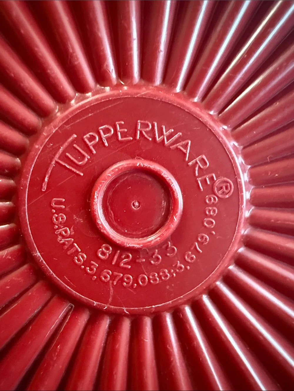 Tupperware replacement lids in orange and burgundy